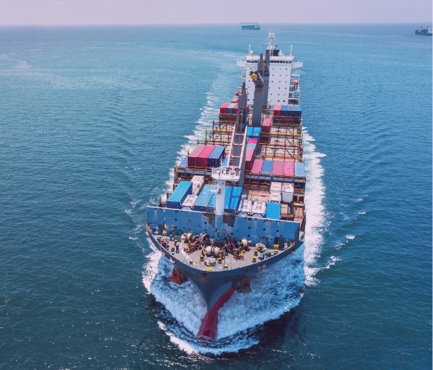 cargo ship carrying container and running